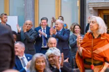 Richard von Weizsäcker Fellows standing and clapping following a keynote address at the Richard von Weizsäcker Forum