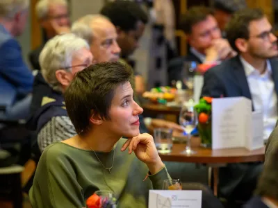 People listening to a speaker during the Richard von Weizsäcker Forum
